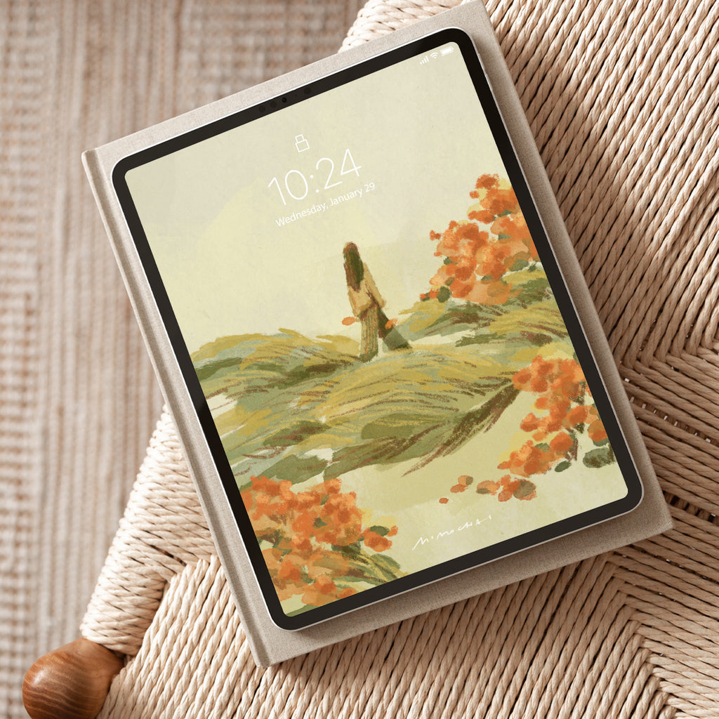 Tablet with a nature-themed wallpaper on a woven surface