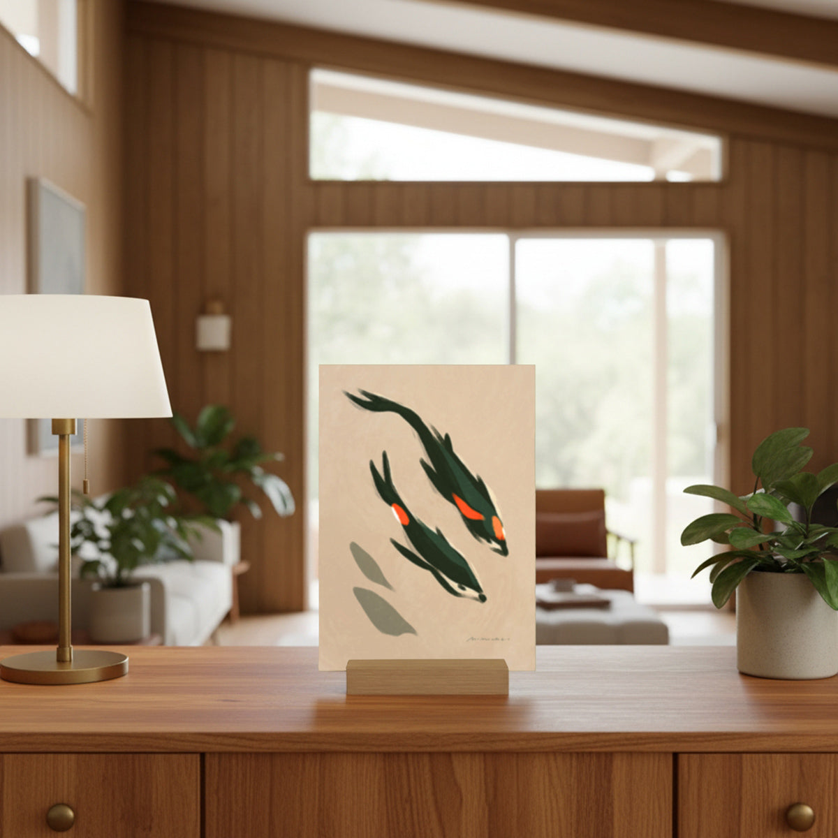 Art print of two koi fish on a stand in a modern living room.