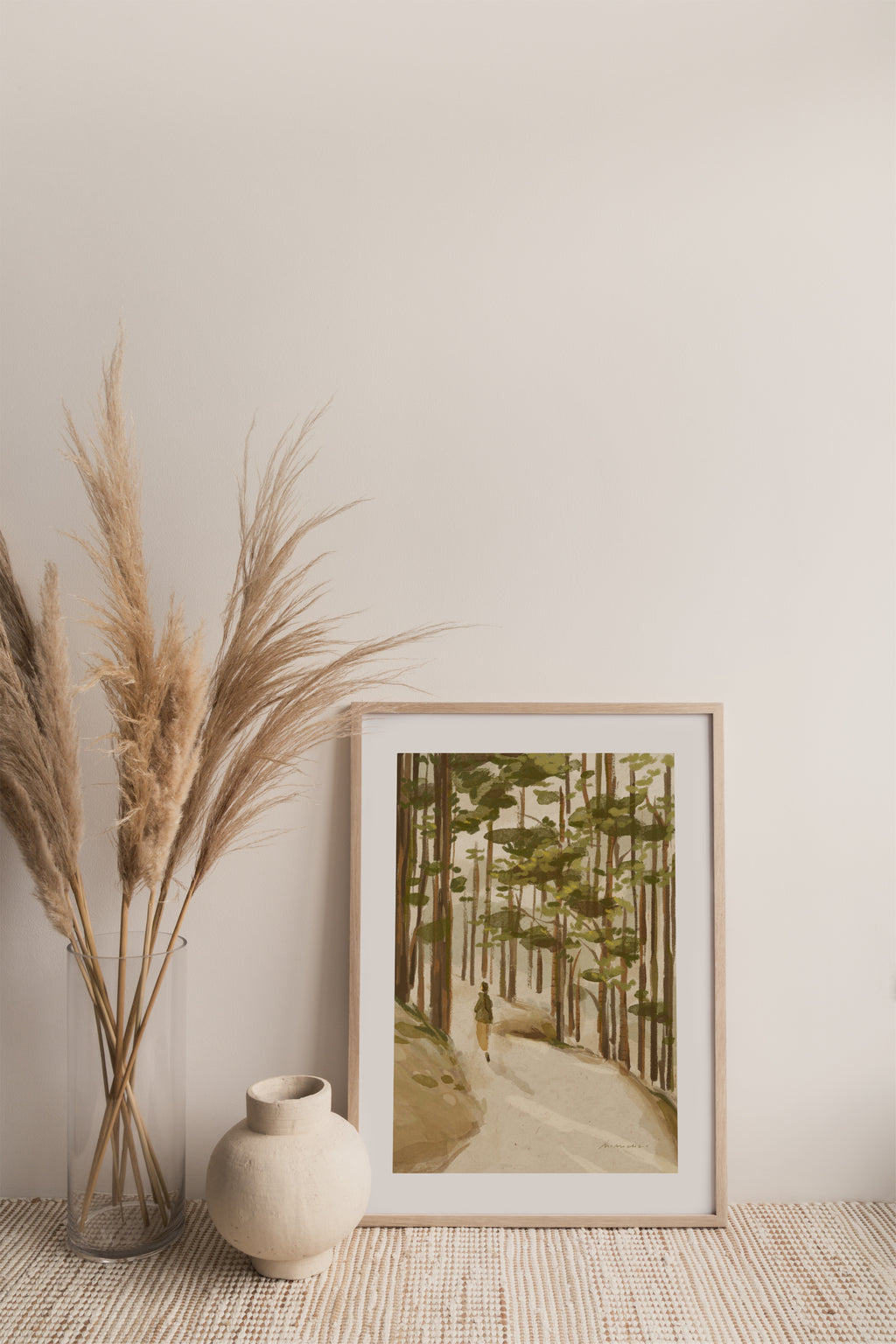 Framed art print of a person walking through a forest surrounded by trees - zen art for home - Mimochai 