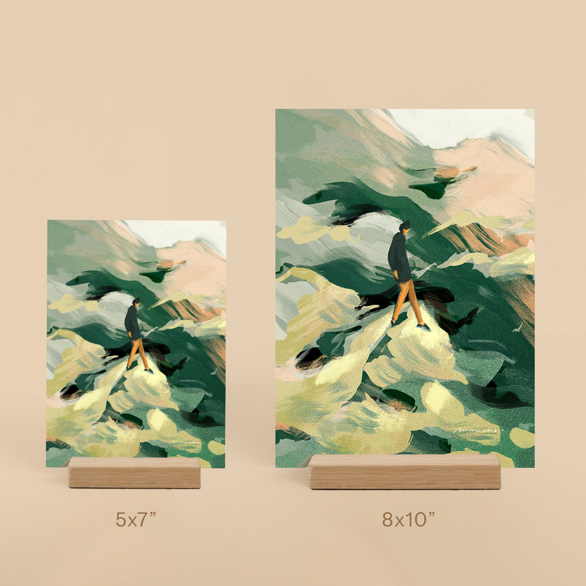 Two art prints of a person walking on water with birds, one 5x7" and one 8x10" on a beige background.