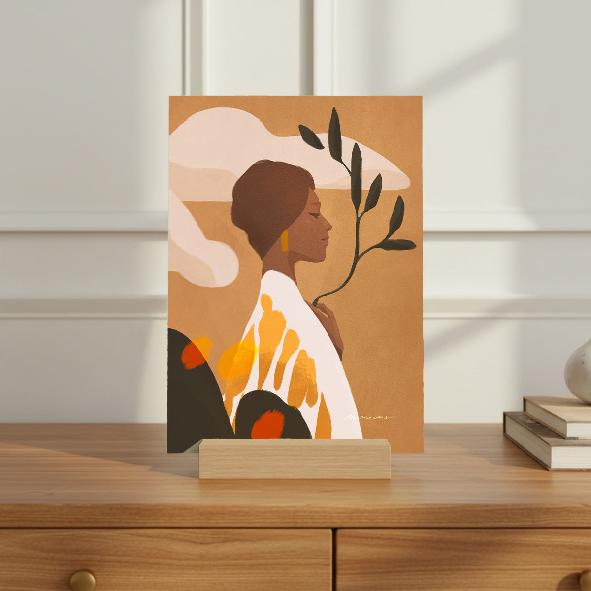 Art print of a stylized woman with leaves on a wooden surface