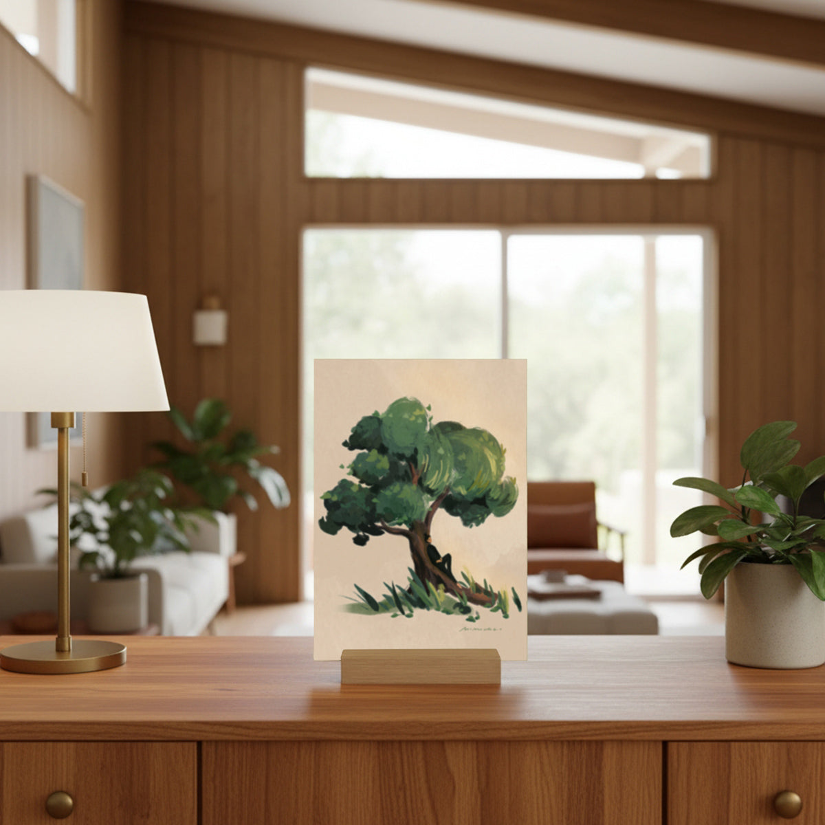 Decorative lamp with tree design on a wooden surface in a living room setting
