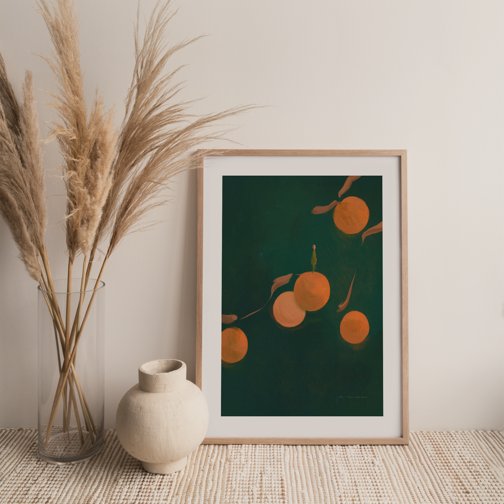 A framed art print featuring a small figure standing on giant oranges - zen art for home decor - Mimochai