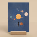 Illustration of a child and dog in front of a solar system in outer space on a blue background.